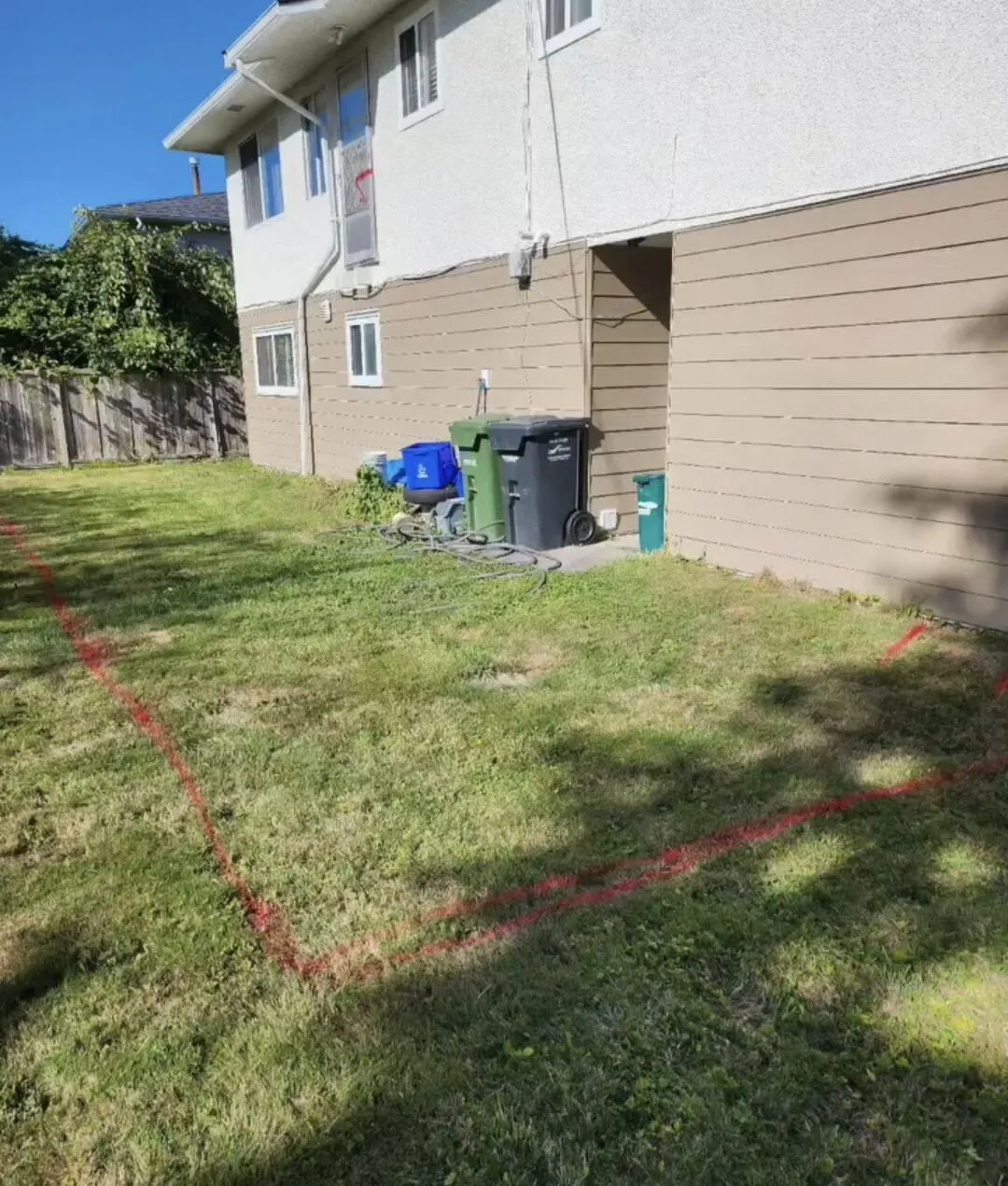 Laying out the new pad on a tired side yard