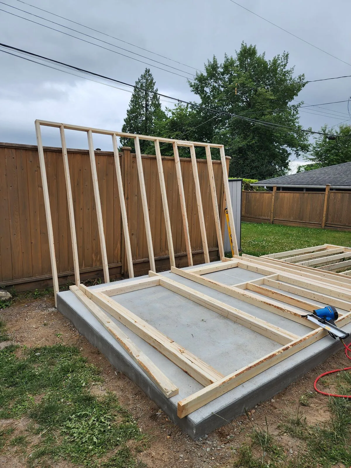 Shed, part one: framing on a poured concrete pad