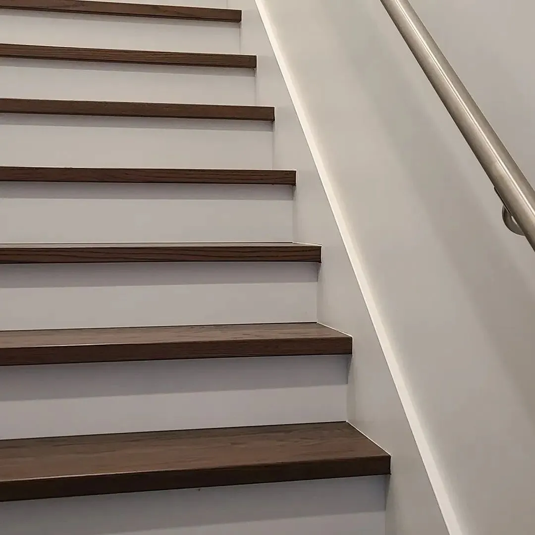 Brushed stainless handrail and tempered glass guardrail