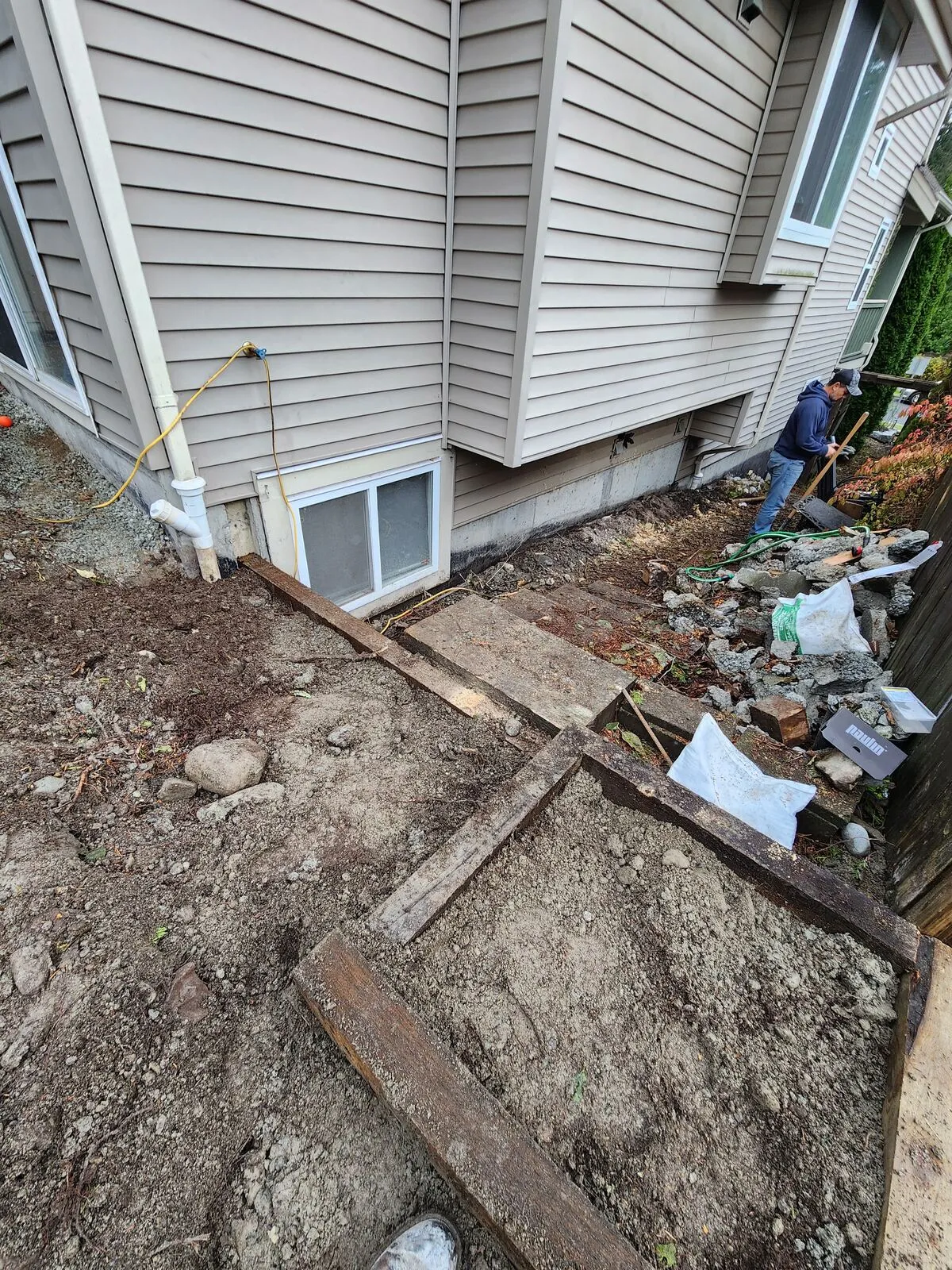 Tiered timber retaining walls and base prep