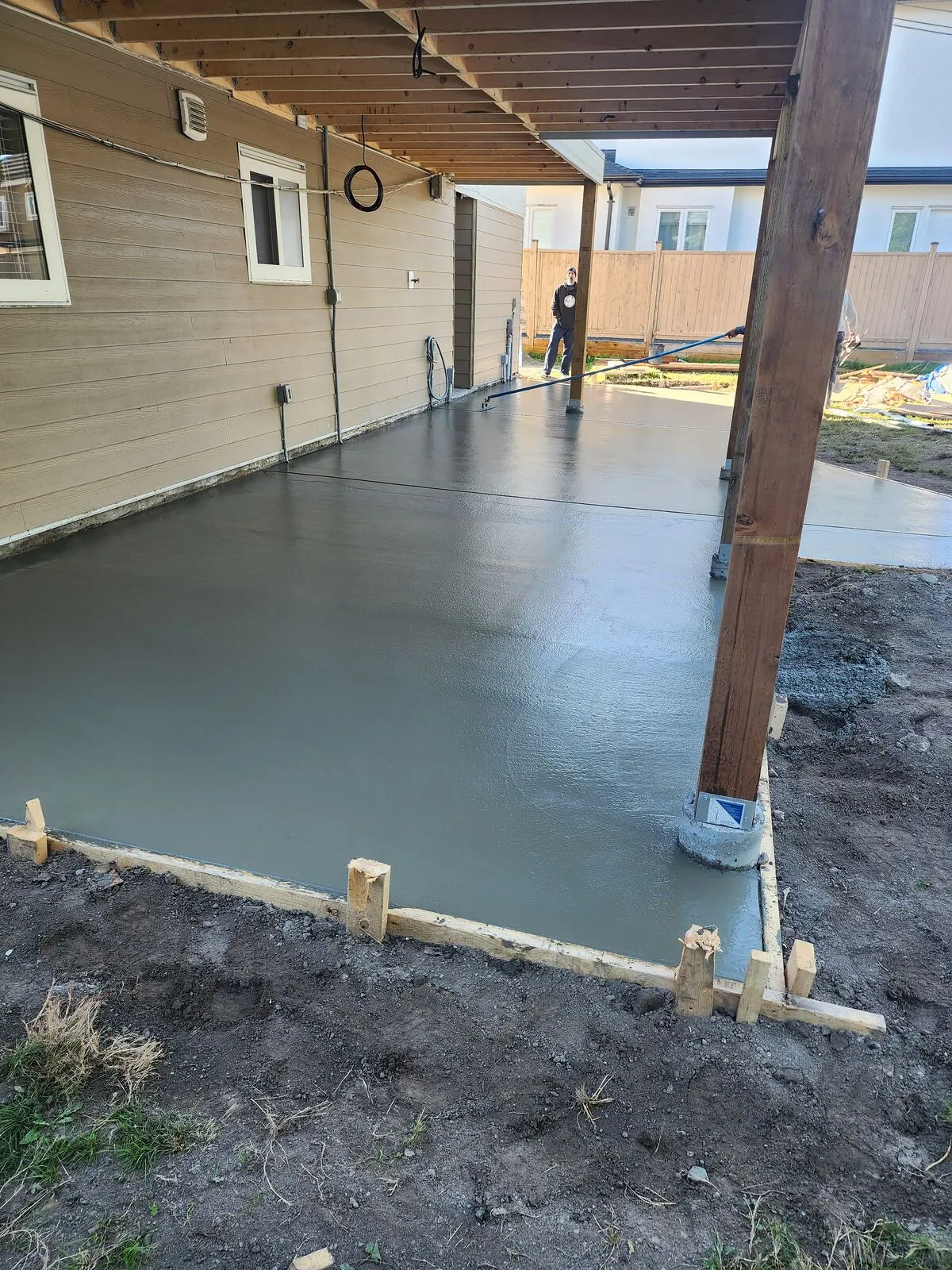 Forming and pouring the concrete patios