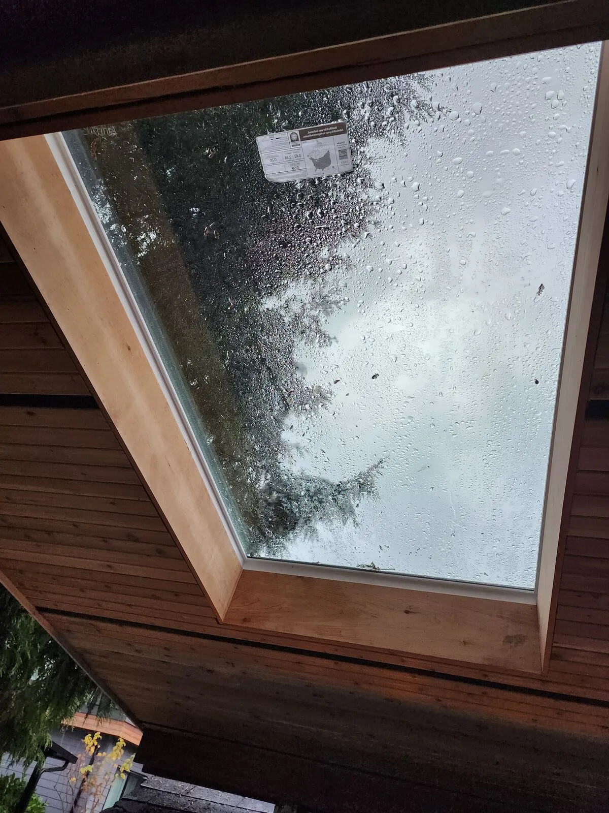 Cedar T&G ceiling with a skylight over the tub