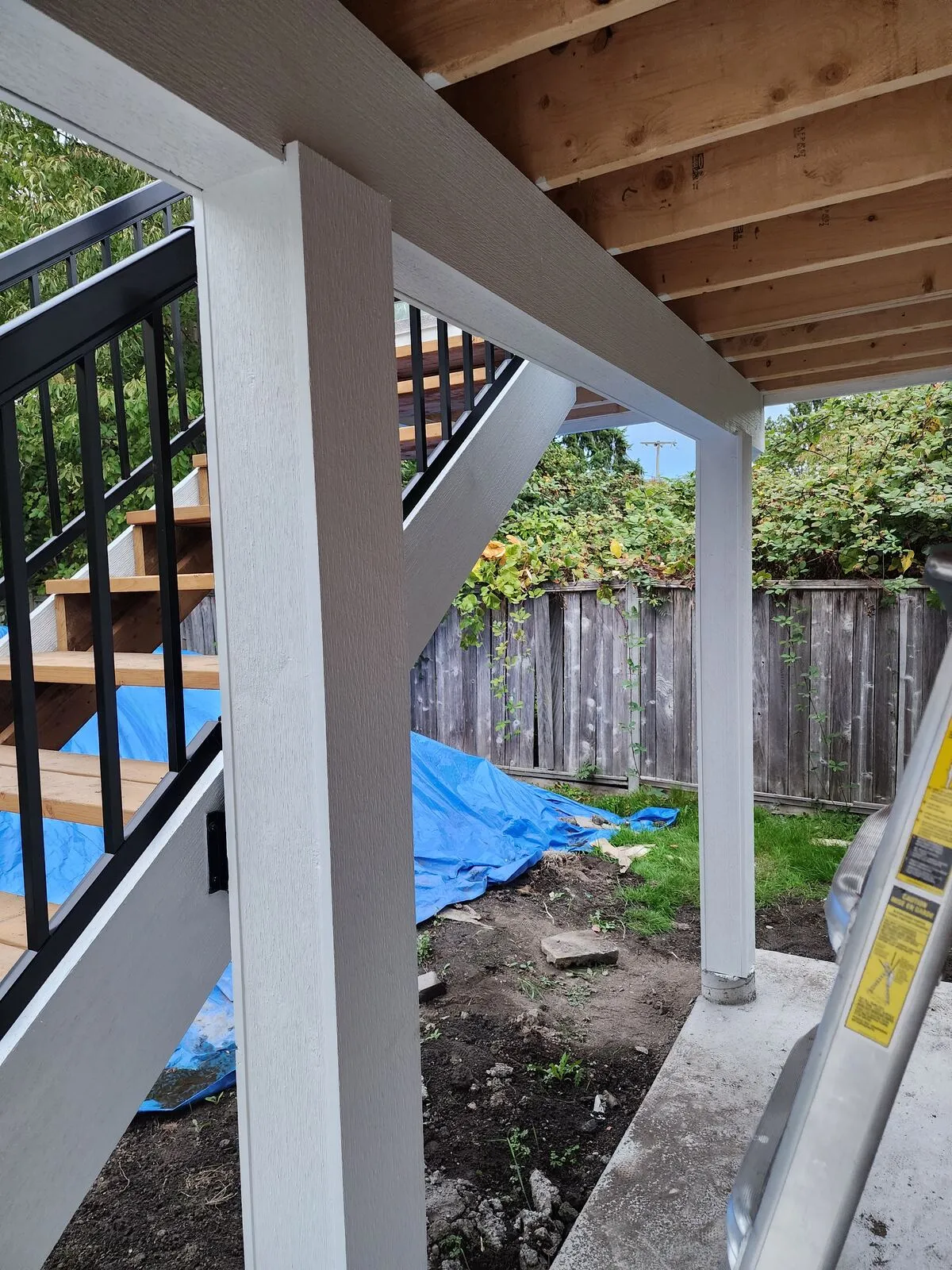 White Hardie post wraps and glass railings
