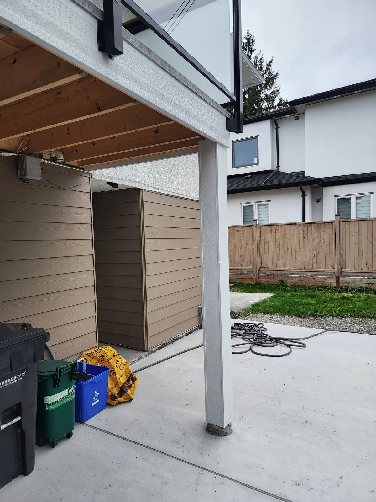 White Hardie post wraps and glass railings