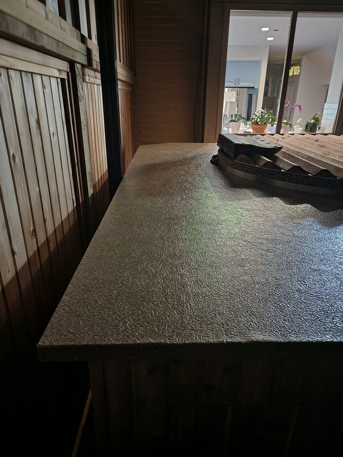 Finish carpentry: cedar cabinet, stone tops and concealed hardware