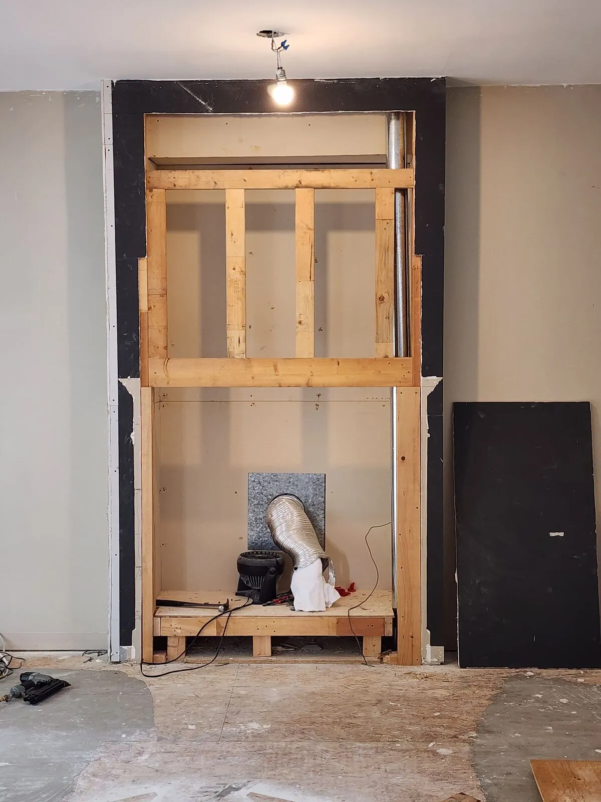 Rebuilding the fireplace: linear gas, whitewashed plank tile, 45° mitred corners