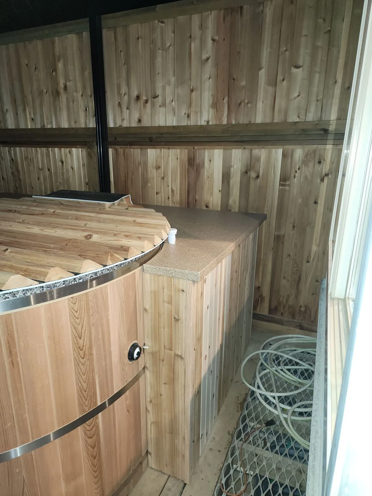 The finished cedar enclosure