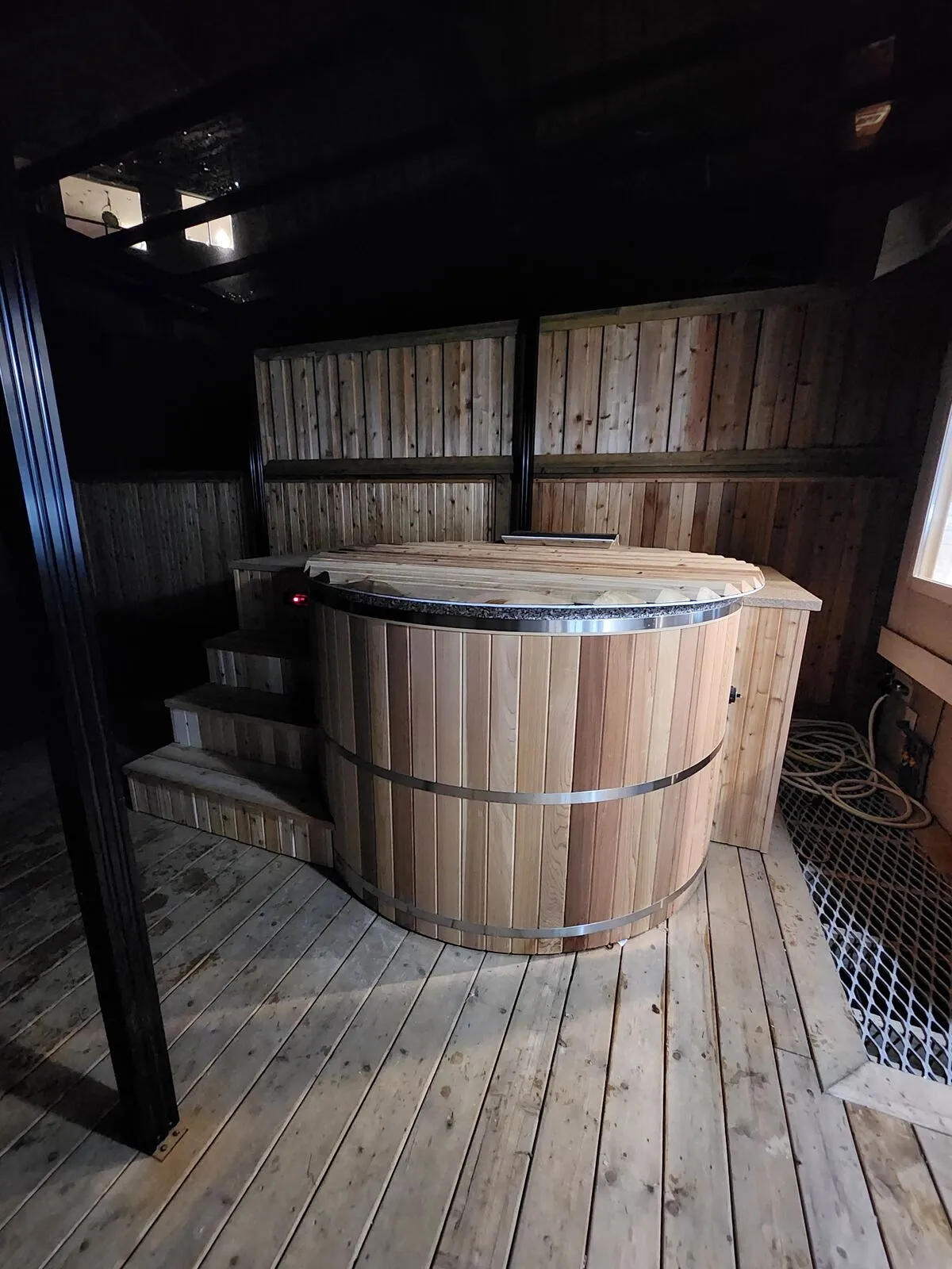 The finished cedar enclosure