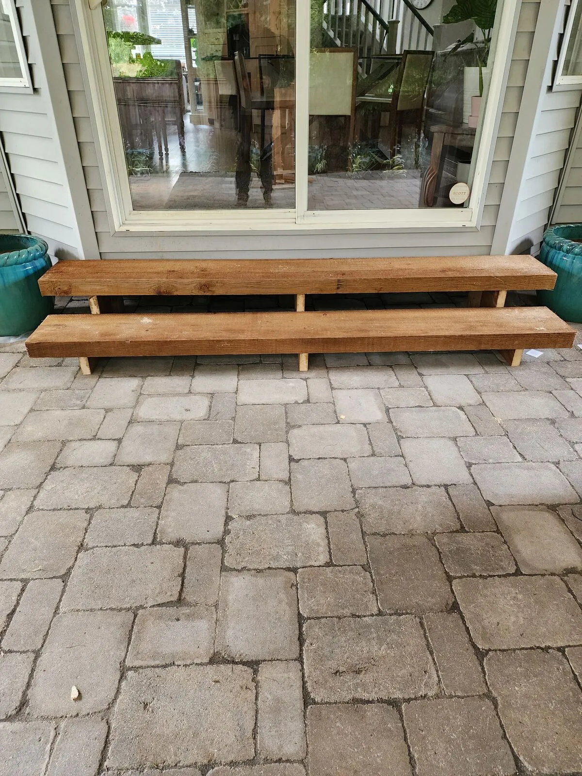 Custom solid-cedar bench steps off the slider