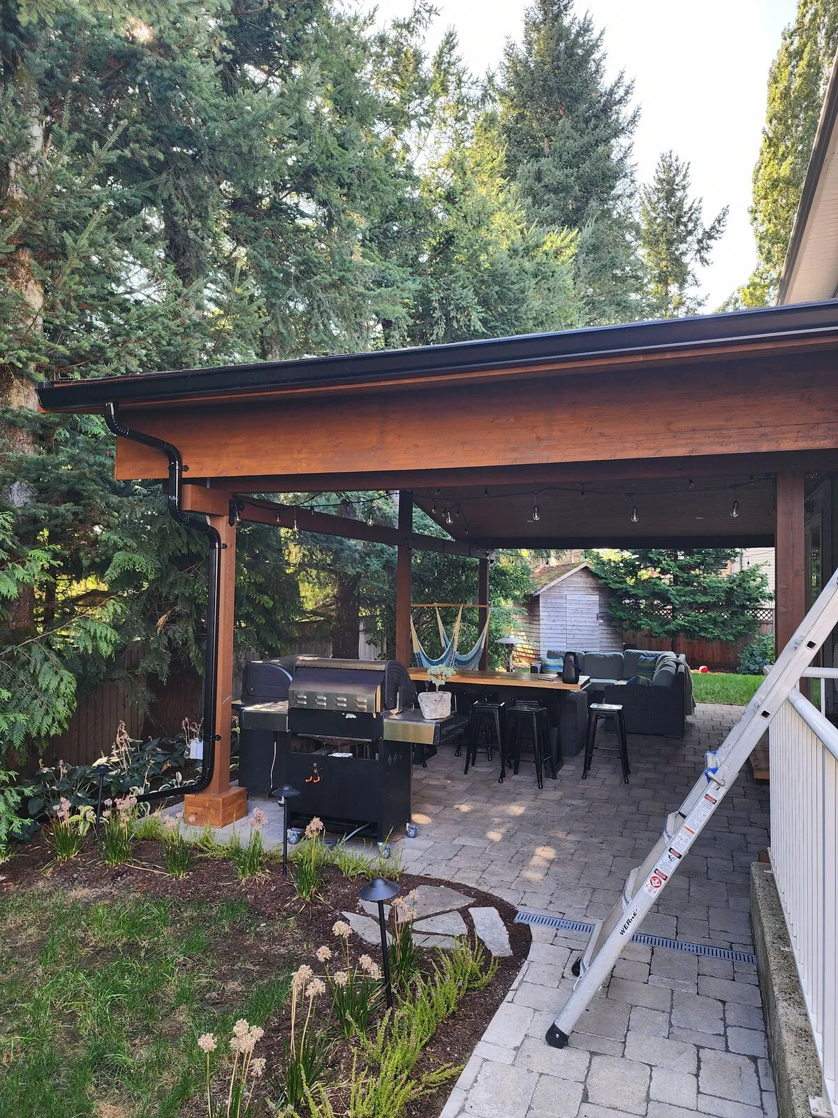 Stain, string lights and the finished outdoor room