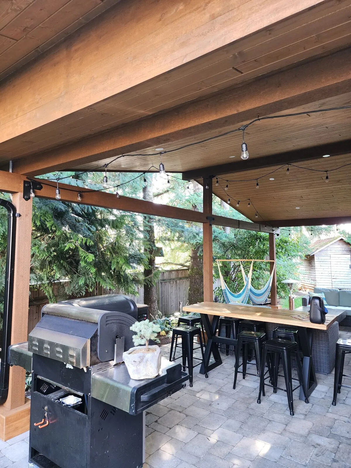Stain, string lights and the finished outdoor room