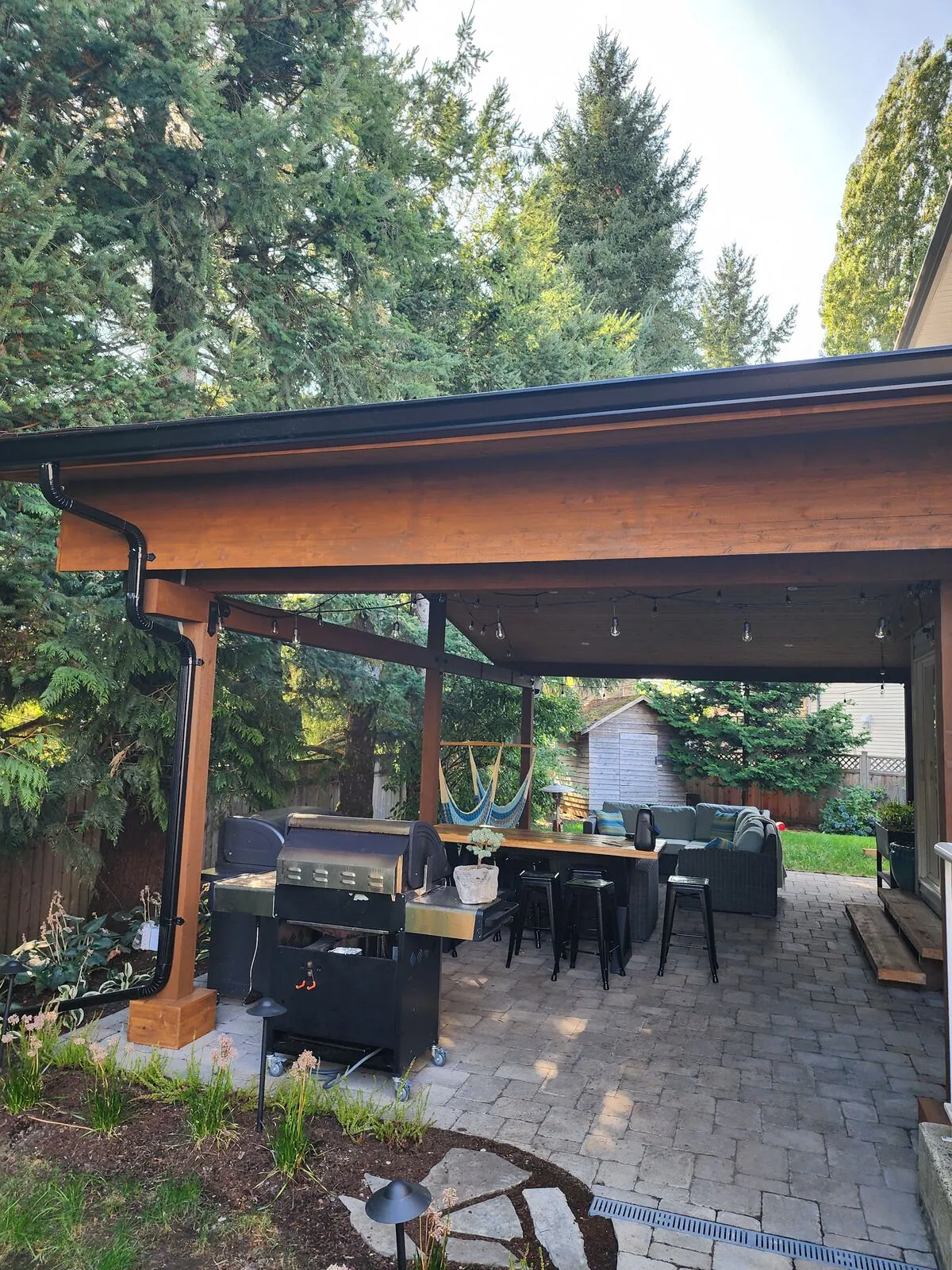 Stain, string lights and the finished outdoor room