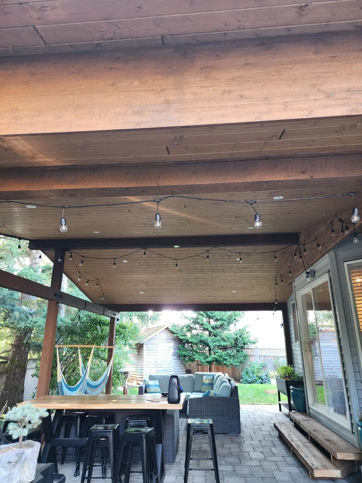 Stain, string lights and the finished outdoor room